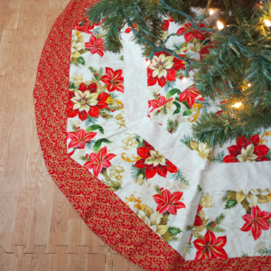 Supreme Accents Red and Gold Poinsettia Striped Tree Skirt