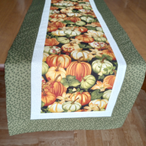 Supreme Accents 2023 Pumpkin Table Runner with Green Border