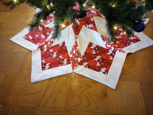 Supreme Accents Red Poinsettia tree skirt Star 60 inches