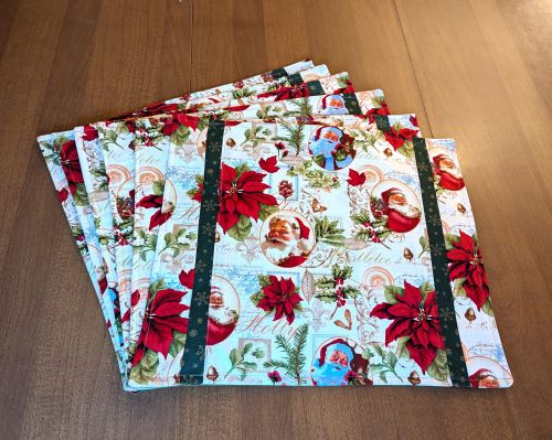 Supreme Accents Classic Santa Placemat Set of 6. Beautiful Santa and poinsettia placemats