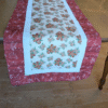 Supreme Accents Gingerbread table runner Quilted Christmas table runner Dining Table Runner kitchen island table runner Christmas themed table runner colorful Christmas table runner console table runner gingerbread table runner kitchen table runner modern farmhouse table runner Christmas runner holiday table runner Christmas table setting Christmas table decor table runner for coffee table runner for dining table xmas table runner