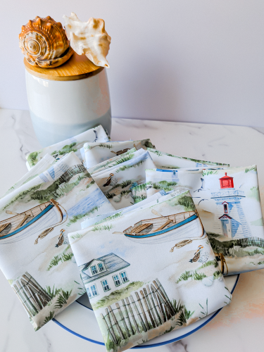 Lighthouse Napkins Handmade coastal kitchen decor ideas Nautical theme dining room accessories Unique lighthouse patterned home accents Eco-friendly reusable cloth napkins for summer Set of 4 handmade cotton napkins with lighthouses Soft cotton nautical napkins for beach house Washable handmade cloth napkins for coastal theme Premium cotton lighthouse napkins for dinner parties