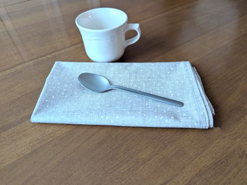 Tan and White Dinner Table Napkins