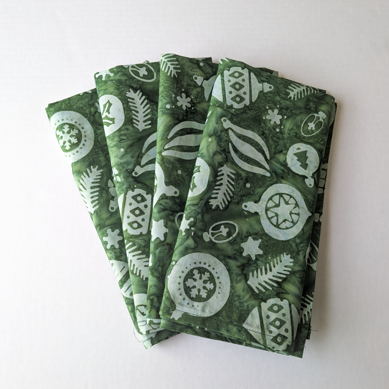 Green batik Christmas dinner napkins, Green Christmas napkins, cloth dinner napkins, holiday cloth napkins, Green batik dinner napkins, ornament print napkins, festive cloth napkin set, artisanal batik holiday table linens, washable cotton Christmas napkins set, Green Christmas napkins, cloth dinner napkins, holiday cloth napkins, Christmas table linens, Supreme Accents