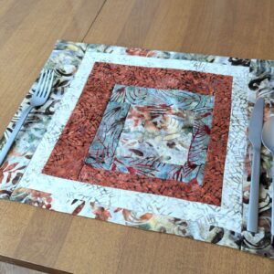 Moss & Rust Batik Placemats,best hand-quilted batik placemats, earth tone dining room decor ideas,Everyday placemats, hand-quilted cotton placemats,handcrafted earth tone batik table linens, handmade batik kitchen table linens,handmade quilted placemats,Handmade table linens,Handmade placemats, modern quilted placemats,patchwork placemats,Quilted placemats,rustic moss green and rust dining runner,placemats for glass table,placemats for kitchen island,Table setting,Unique placemats