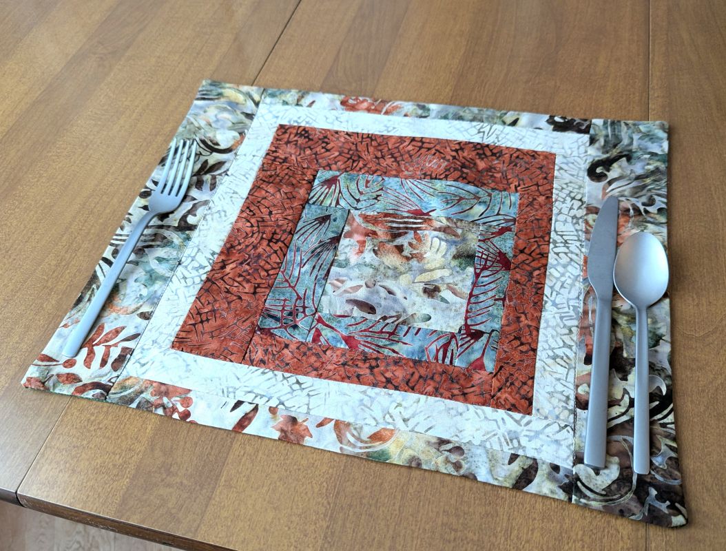 Moss & Rust Batik Placemats,best hand-quilted batik placemats, earth tone dining room decor ideas,Everyday placemats, hand-quilted cotton placemats,handcrafted earth tone batik table linens, handmade batik kitchen table linens,handmade quilted placemats,Handmade table linens,Handmade placemats, modern quilted placemats,patchwork placemats,Quilted placemats,rustic moss green and rust dining runner,placemats for glass table,placemats for kitchen island,Table setting,Unique placemats