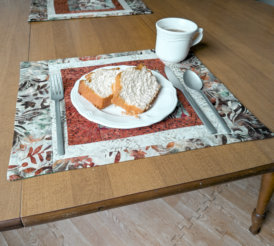 Moss & Rust Batik Placemats,best hand-quilted batik placemats, earth tone dining room decor ideas,Everyday placemats, hand-quilted cotton placemats,handcrafted earth tone batik table linens, handmade batik kitchen table linens,handmade quilted placemats,Handmade table linens,Handmade placemats, modern quilted placemats,patchwork placemats,Quilted placemats,rustic moss green and rust dining runner,placemats for glass table,placemats for kitchen island,Table setting,Unique placemats
