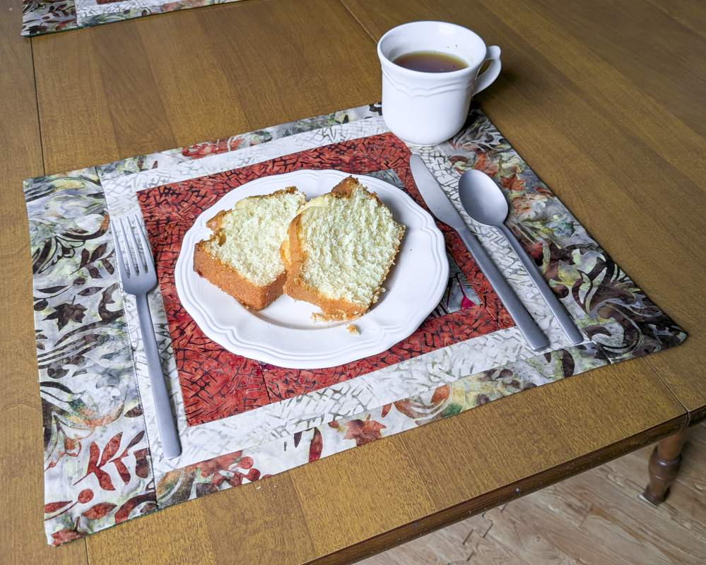 Moss & Rust Batik Placemats,best hand-quilted batik placemats, earth tone dining room decor ideas,Everyday placemats, hand-quilted cotton placemats,handcrafted earth tone batik table linens, handmade batik kitchen table linens,handmade quilted placemats,Handmade table linens,Handmade placemats, modern quilted placemats,patchwork placemats,Quilted placemats,rustic moss green and rust dining runner,placemats for glass table,placemats for kitchen island,Table setting,Unique placemats