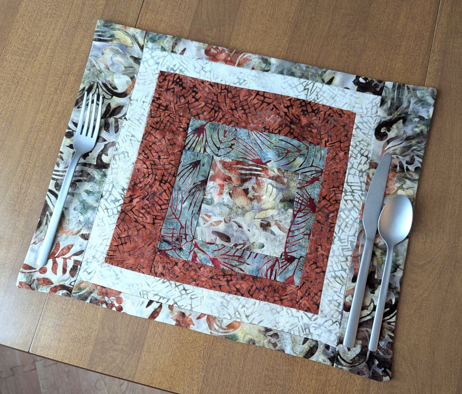 Moss & Rust Batik Placemats,best hand-quilted batik placemats, earth tone dining room decor ideas,Everyday placemats, hand-quilted cotton placemats,handcrafted earth tone batik table linens, handmade batik kitchen table linens,handmade quilted placemats,Handmade table linens,Handmade placemats, modern quilted placemats,patchwork placemats,Quilted placemats,rustic moss green and rust dining runner,placemats for glass table,placemats for kitchen island,Table setting,Unique placemats