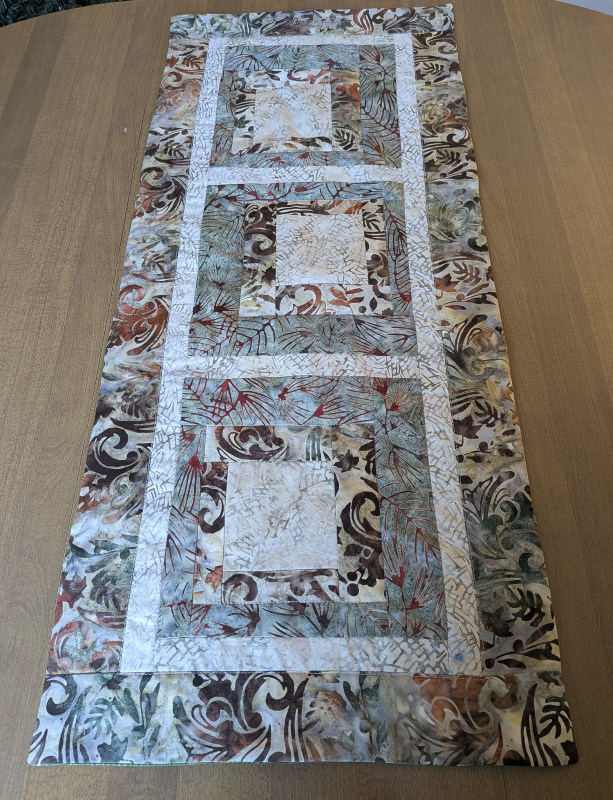 Moss & Tan Batik Table Runner,Batik Table Runner,best hand-quilted batik table runner, earth tone dining room decor ideas,Everyday table runner, hand-quilted cotton table runner,handcrafted earth tone batik table linens, handmade batik kitchen table linens,handmade quilted table runners,Handmade table linens,Handmade Table Runner, modern quilted table runners,patchwork table runner,Quilted Table Runner,rustic moss green and rust dining runner,Table runner for glass table,Table runner for kitchen island,Table setting,Unique table runner