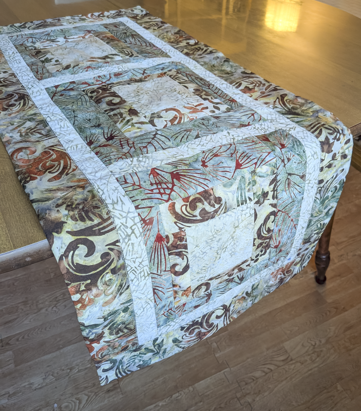 Moss & Tan Batik Table Runner,Batik Table Runner,best hand-quilted batik table runner, earth tone dining room decor ideas,Everyday table runner, hand-quilted cotton table runner,handcrafted earth tone batik table linens, handmade batik kitchen table linens,handmade quilted table runners,Handmade table linens,Handmade Table Runner, modern quilted table runners,patchwork table runner,Quilted Table Runner,rustic moss green and rust dining runner,Table runner for glass table,Table runner for kitchen island,Table setting,Unique table runner